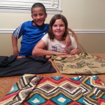 Madeline and her brother Sam with 3 wheelchair Buddee Bags